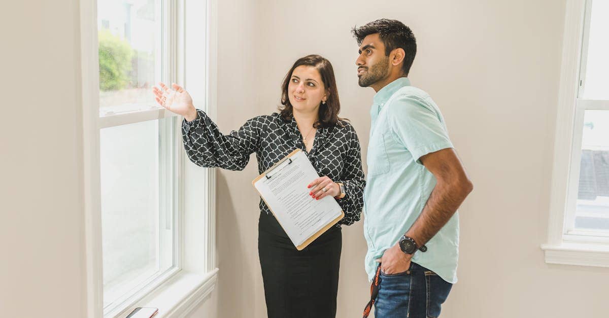 Real estate agent using a laptop to access MLS, symbolizing how to get MLS access and unlock property data.